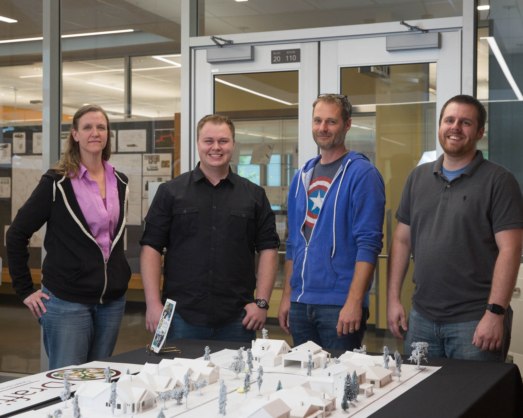 four students working on a capstone project